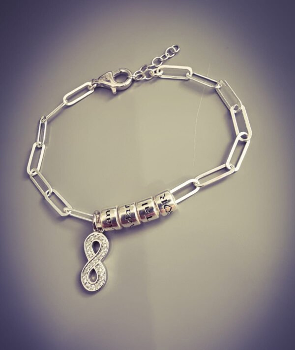 Bracelet with an Infinity Pendant and Charms - Image 2